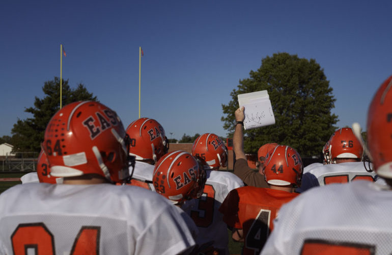 football players coach